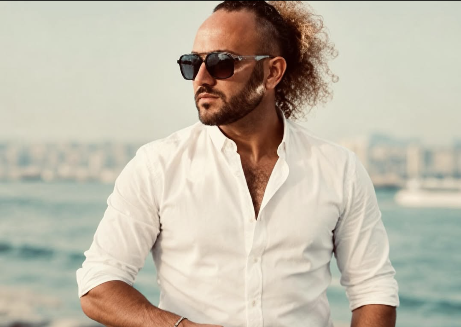 Portrait of Antonio Morelli, white shirt, by the sea